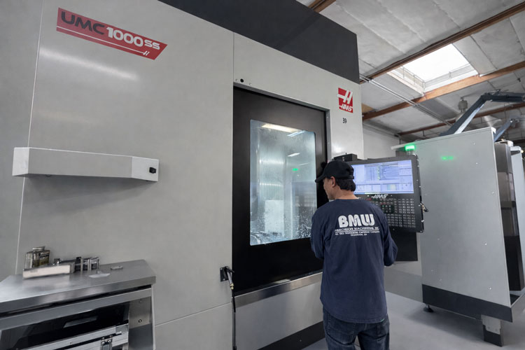 High-performance Haas UMC-1000 5-axis CNC machining center at BMW Precision Machining.