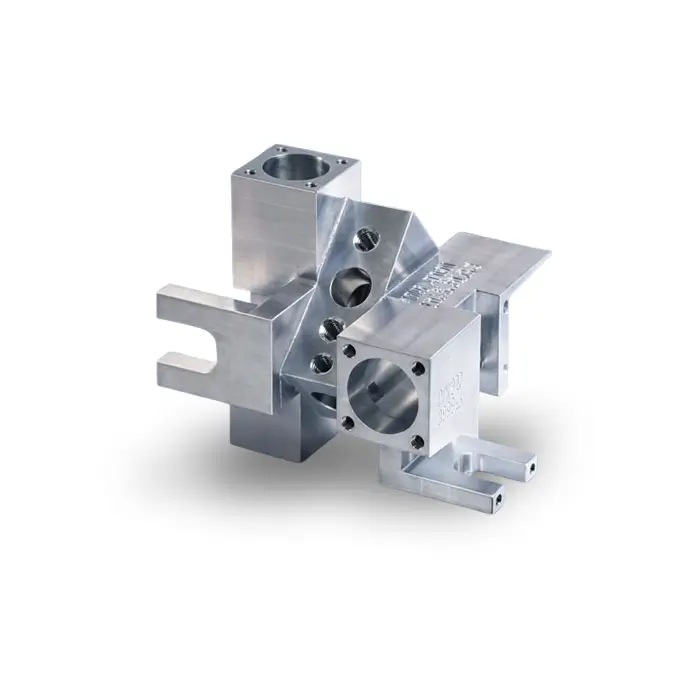Intricate manifold block component manufactured via precision milled components techniques.